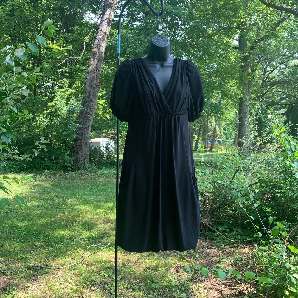 Black stretchy Dress with ballon hem and pockets Size small